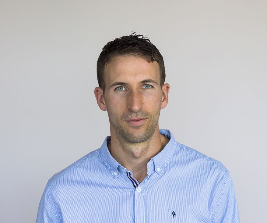Portrait of Eddy, medical aesthetic department member, providing project development support and device training for clients.