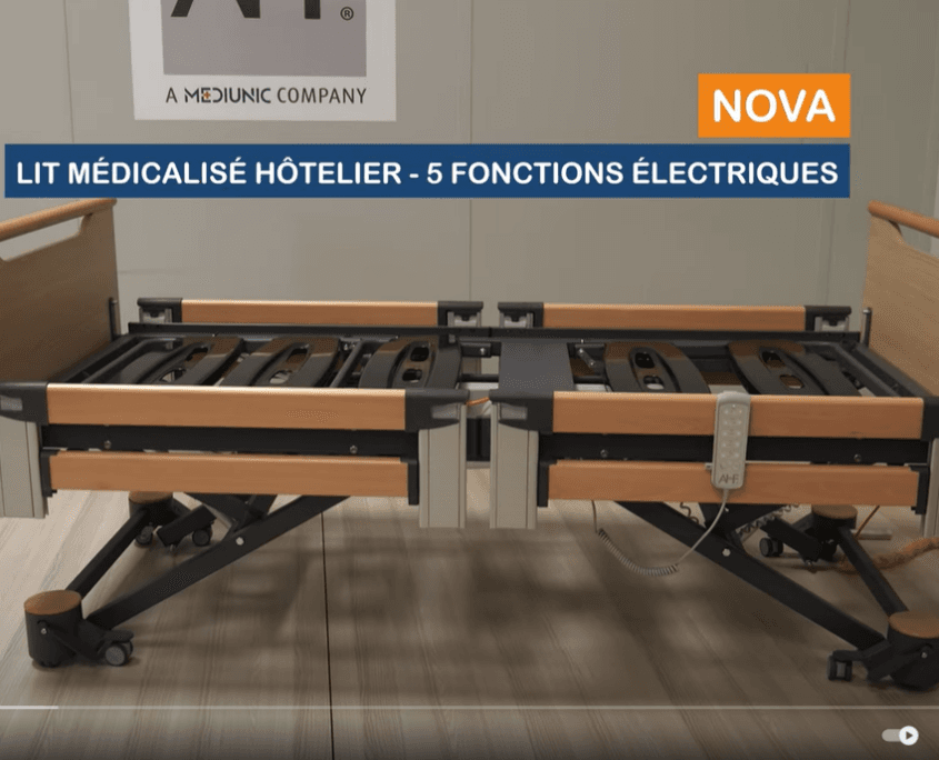 A single medical bed frame with wooden side rails and an attached remote control, displayed against a plain wall with marketing text.