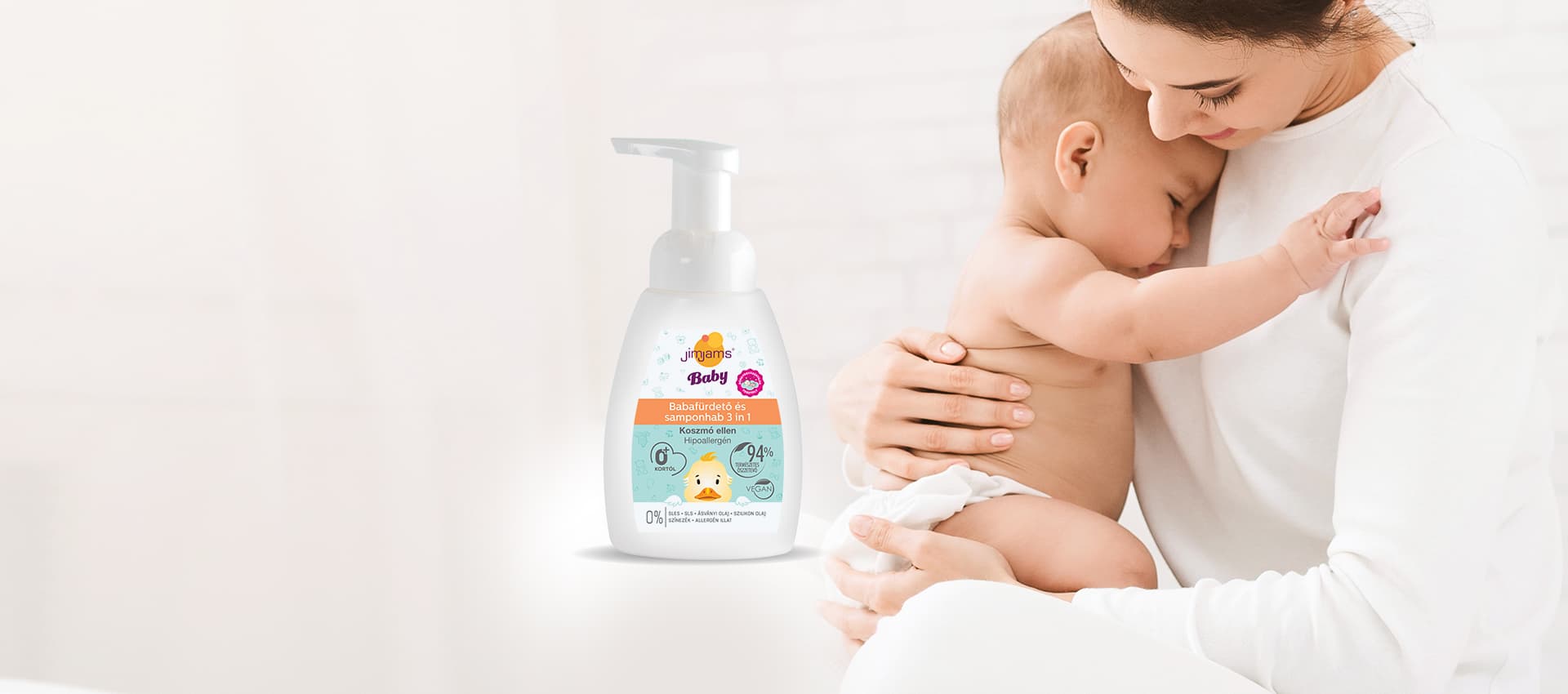 A woman holding a baby next to a single bottle of baby soap, presented as a lifestyle marketing banner.
