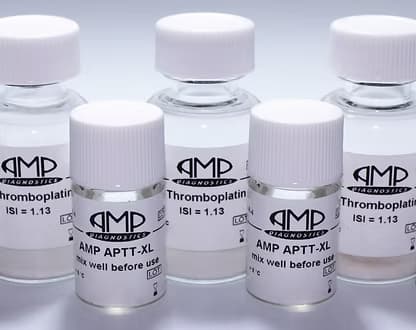 A collection of five small glass reagent vials labeled AMP Diagnostics, arranged together on a plain light background for product display.