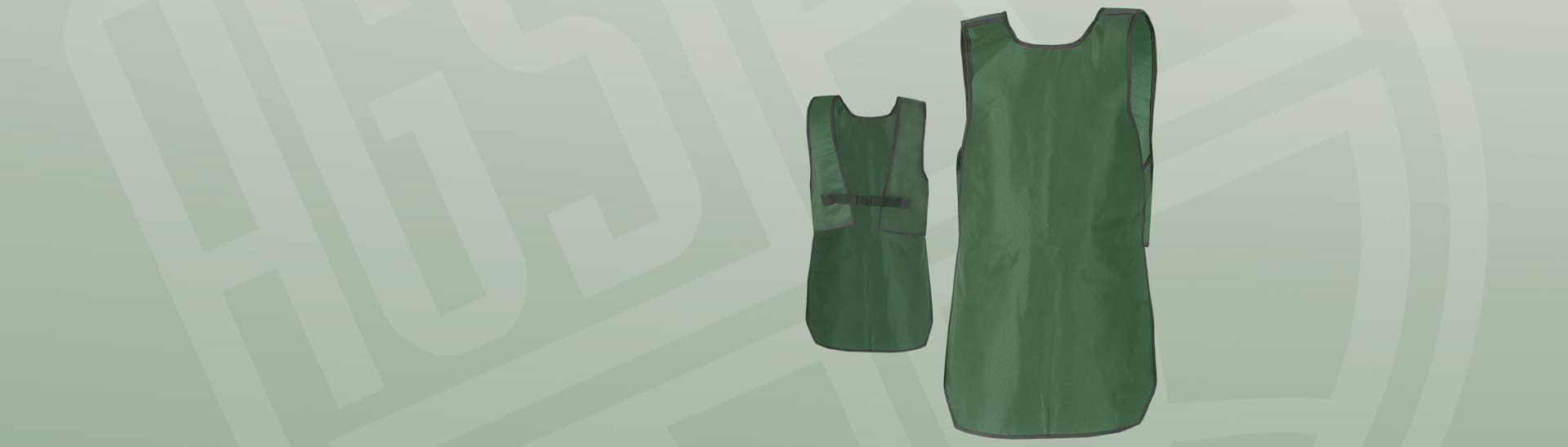 Two green lead-lined radiation protection vests displayed against a light green background with faint, large-scale watermark text.