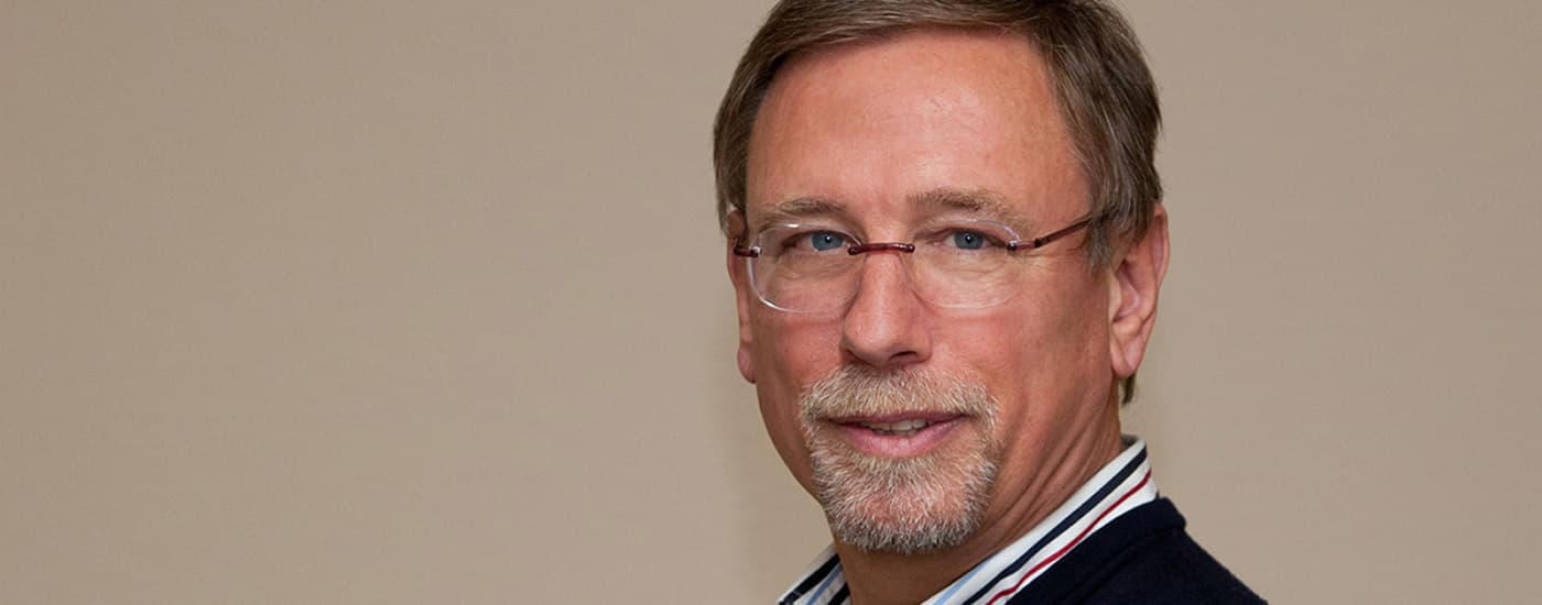 Professional headshot of Dr. Roedger, representing company leadership.