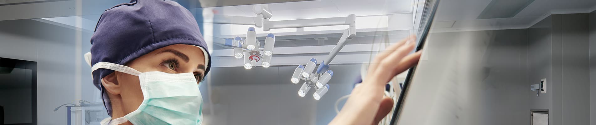 A composite image featuring a masked surgeon in a sterile operating room environment with overhead surgical lighting and a digital display screen.