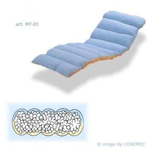 Shows a different product variant (fiber-filled silicone mattress/long cushion, art. MT-01) from the same Coremec product line with matching branding.